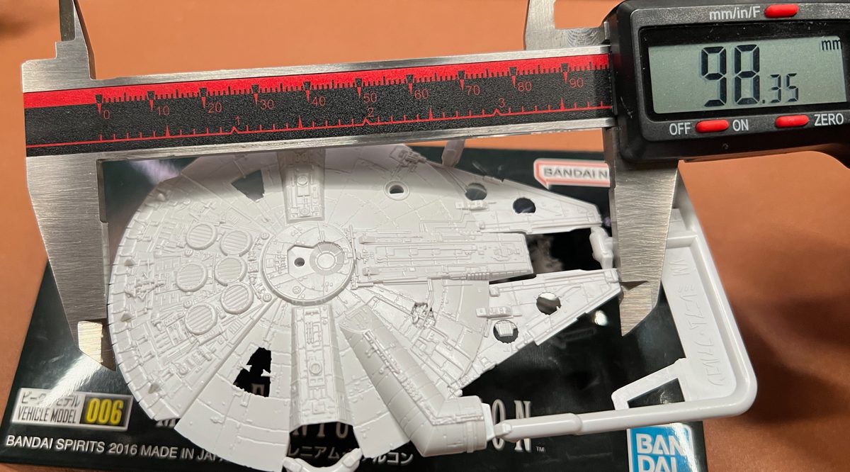 Measuring a scale model with calipers to derive its scale